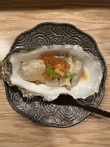 Jumbo oyster from Washington state with salmon roe